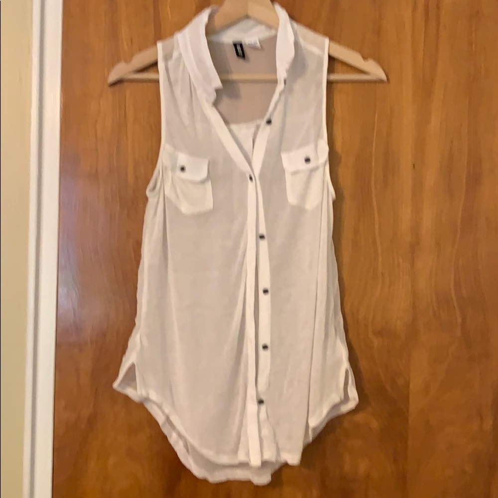 White sleeveless button up